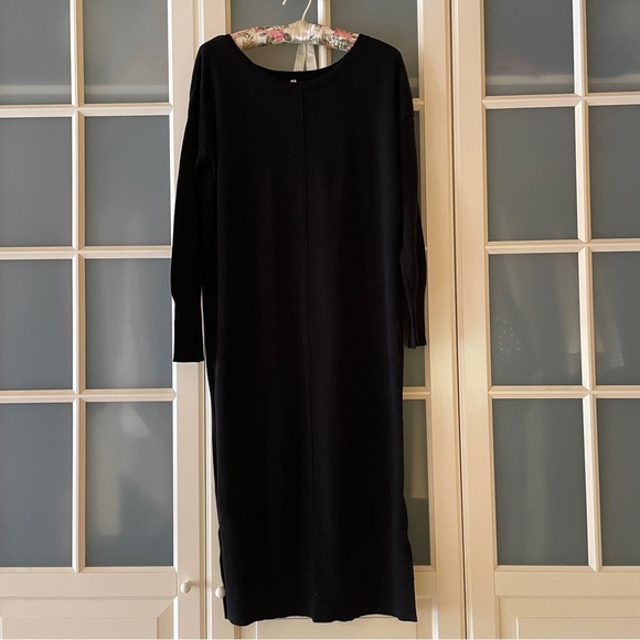 Long sweater with side slits, hits mid calf. Nice over leggings or jeans. - Picture 2 of 4